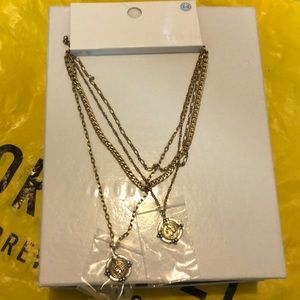 4 layered necklaces, 2pendants, new never used.